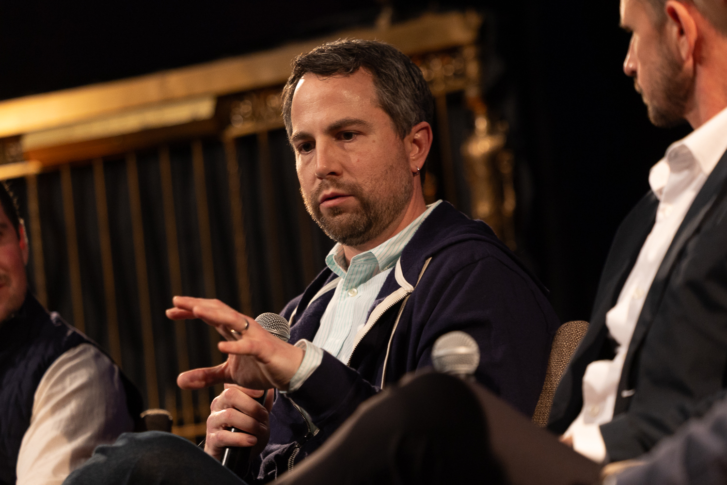 Brian Weisberg speaking on stage